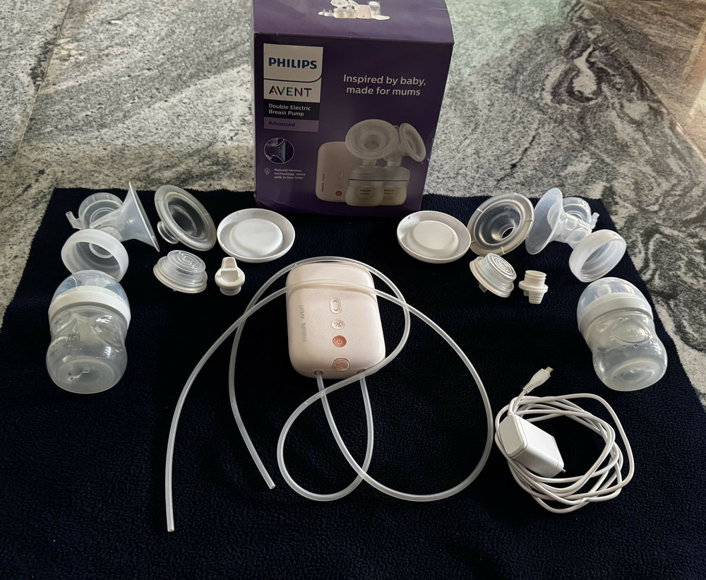 PHILIPS AVENT Double Electric Breast Pump in Almost New condition featuring dual pumping functionality, adjustable settings, comfortable breast cushions, and an easy-to-use design for convenient breast milk expression.