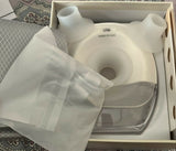 PROMOM NEO wearable breast pump with hands-free design, compact milk collection cups, adjustable suction, and portable pumping support for breastfeeding mothers.