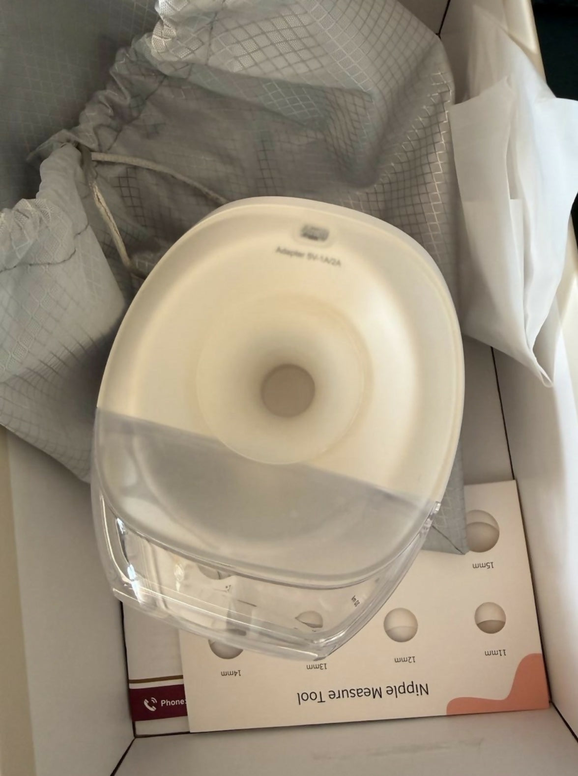 PROMOM hands-free electric breast pump with wearable design, soft silicone flange, adjustable suction modes, and portable fit for convenient milk expression.