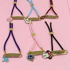 Personalized Bond Band Rakhi with charm featuring custom name personalization, decorative charm detail, comfortable band design, and a thoughtful keepsake for Raksha Bandhan celebrations.