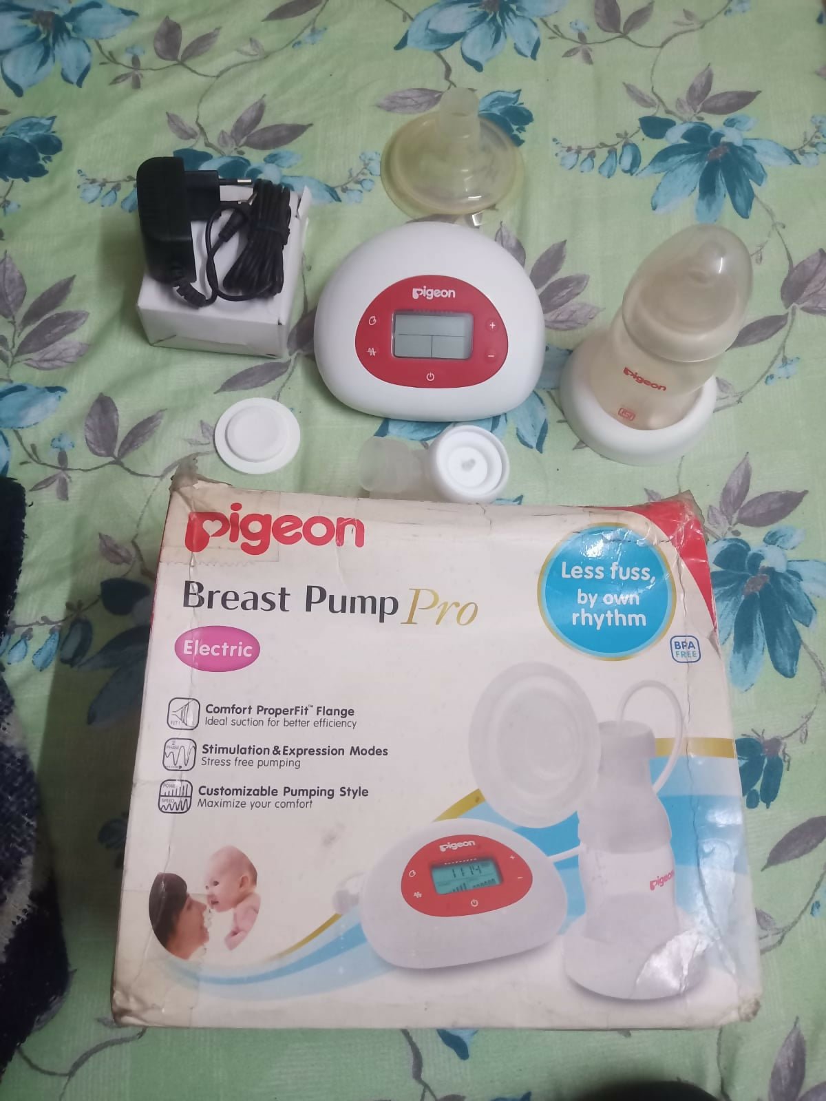 Pigeon electric breast pump with adjustable suction levels, soft silicone breast cushion, quiet operation, and efficient milk expression for comfortable breastfeeding support.