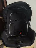 R for Rabbit Picaboo Sportz carry cot with cushioned seating, secure safety harness, portable carry handle, comfortable support, and travel-friendly design for babies.