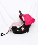 BABYHUG infant car seat carry cot with baby carrier function, rear-facing design, cushioned seat, secure safety harness, and carry handle for newborns and infants up to 13 kg.