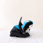 Evenflo Embrace infant car seat with base, rear-facing design, cushioned newborn support, secure safety harness, and portable baby carrier functionality for safe travel.