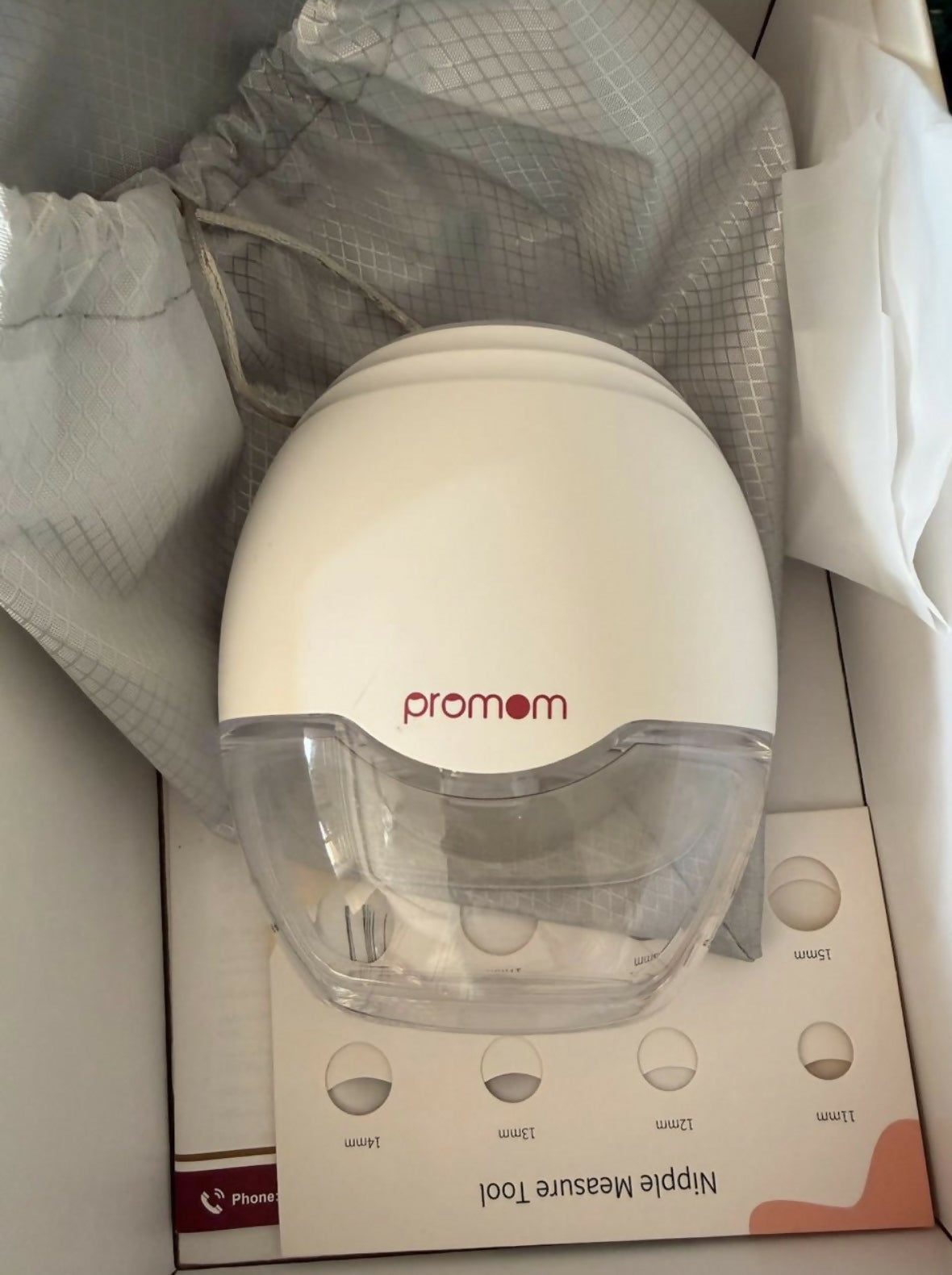 PROMOM hands-free electric breast pump with wearable design, soft silicone flange, adjustable suction modes, and portable fit for convenient milk expression.