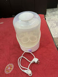 Keep your baby's feeding essentials clean and safe with the CHICCO Baby Steriliser/Sterilizer for Baby, offering efficient steam sterilization for bottles, nipples, pacifiers, and more. With its spacious design and user-friendly controls, it's the perfect addition to any parent's kitchen.