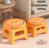 Two orange folding stools with fruit design 