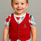 Child wearing a red vest