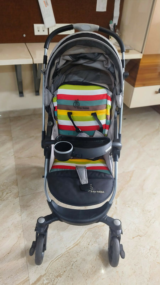 R FOR RABBIT Chocolate Ride Baby Stroller/Pram featuring a comfortable reclining seat, protective canopy, safety harness, smooth wheels, storage space, and a practical foldable design for everyday outings with your baby.