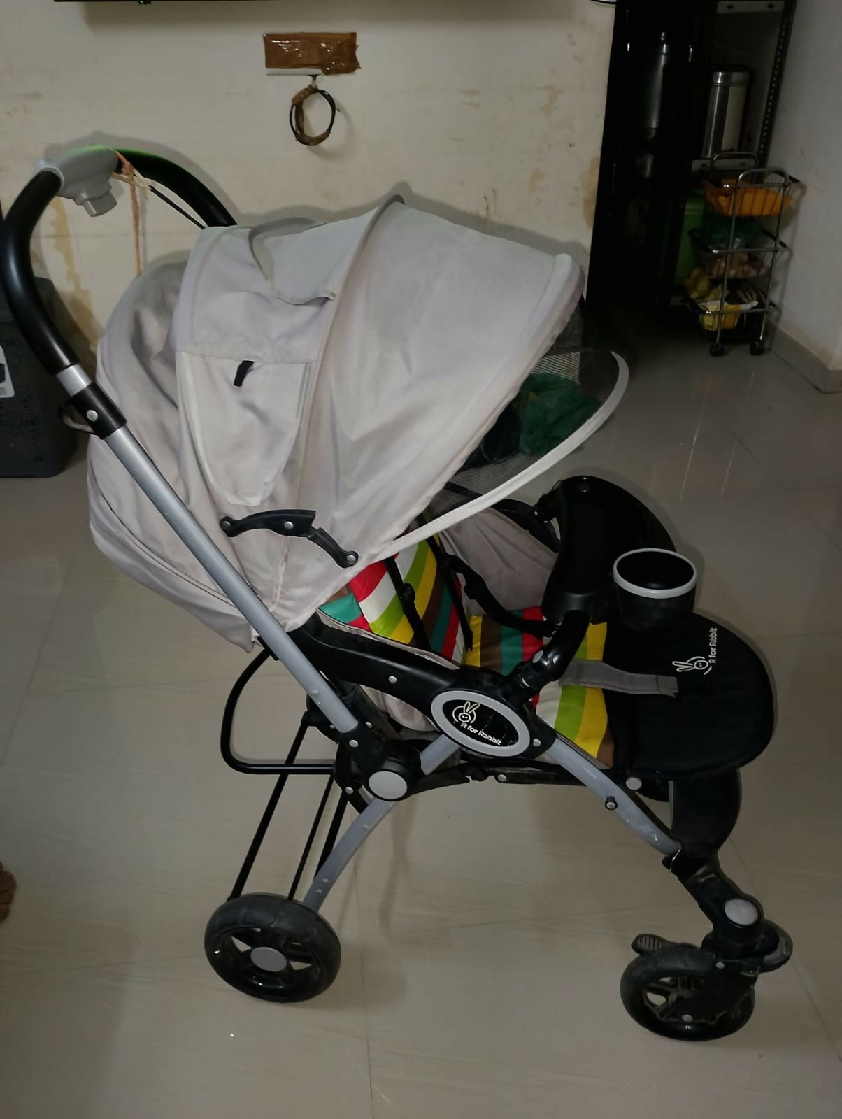 R for Rabbit Chocolate Ride toddler pram with reclining seat, foldable design, safety harness, adjustable canopy, smooth wheels, and comfortable travel support for babies and toddlers.
