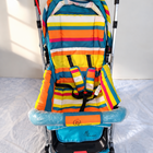 R FOR RABBIT Lollipop Lite Baby Pram B187 in Rainbow with reversible handle and reclining seat.