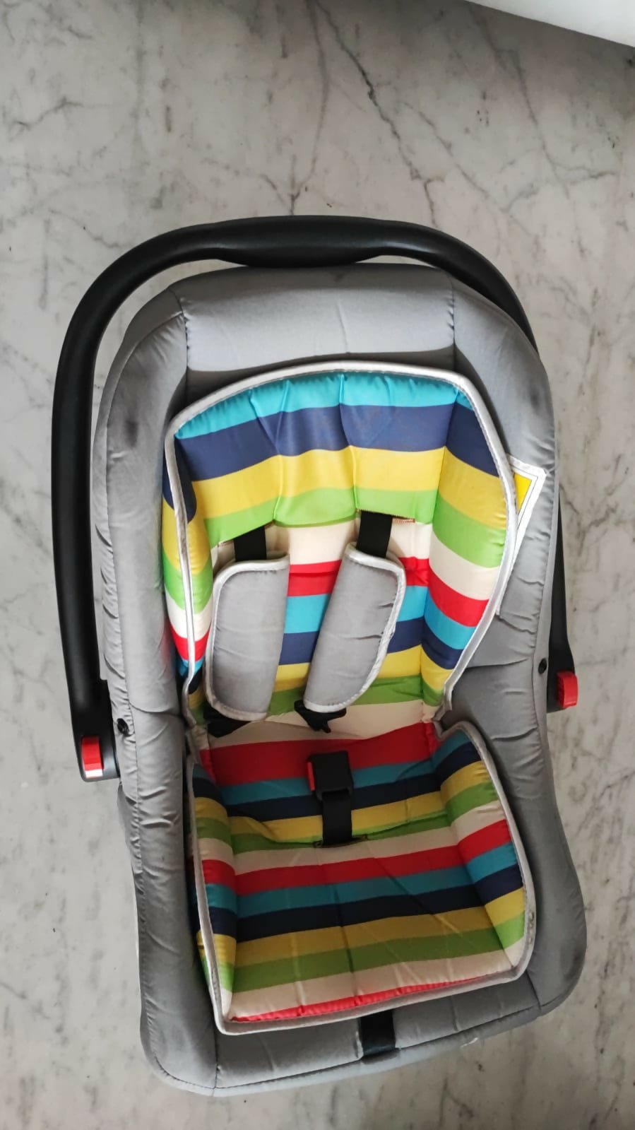 R for Rabbit Picaboo 4 in 1 multipurpose car seat cum carry cot with cushioned seating, safety harness, carry handle, and versatile design for safe travel and everyday use.