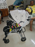 R for Rabbit Chocolate Ride toddler pram with reclining seat, foldable design, safety harness, adjustable canopy, smooth wheels, and comfortable travel support for babies and toddlers.