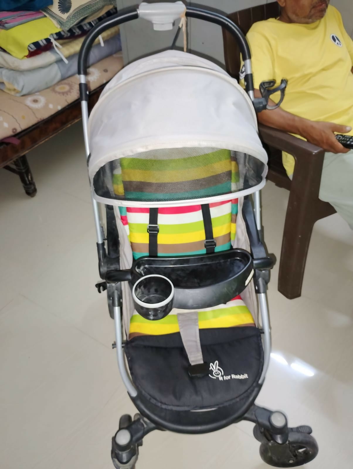 R for Rabbit Chocolate Ride toddler pram with reclining seat, foldable design, safety harness, adjustable canopy, smooth wheels, and comfortable travel support for babies and toddlers.