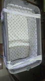 R for Rabbit Hop A Little baby cot bedside bassinet with saturdy frame, breathable sides, adjustable height, and a cozy sleeping space for newborns and infants.