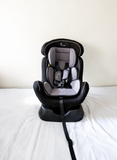 R for Rabbit Jack N Jill convertible car seat with rear and forward-facing modes, adjustable safety harness, cushioned seating, side protection, and support for children from 0–25 kg.
