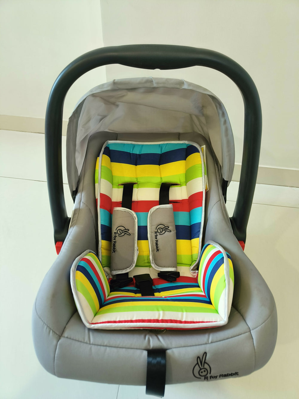 R FOR RABBIT Multicoloured Baby Carry Cot Cum Car Seat with versatile infant travel design.