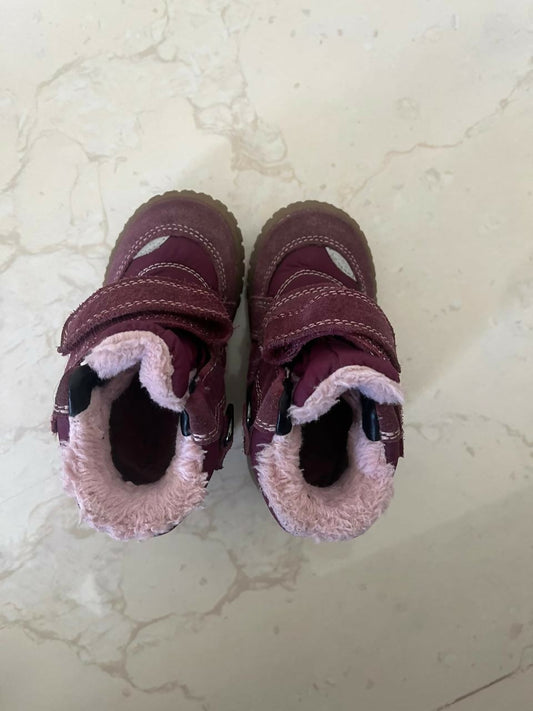 Keep your baby girl's feet warm and stylish with our Purple Colored Boots, featuring plush lining and secure closure for all-day comfort.