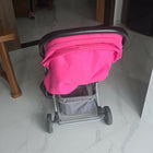 BABYHUG 2 in 1 Rock and Roll stroller cum rocker with reclining seat, sturdy wheels, safety harness, canopy, and dual stroller-to-rocker design for baby comfort and travel.