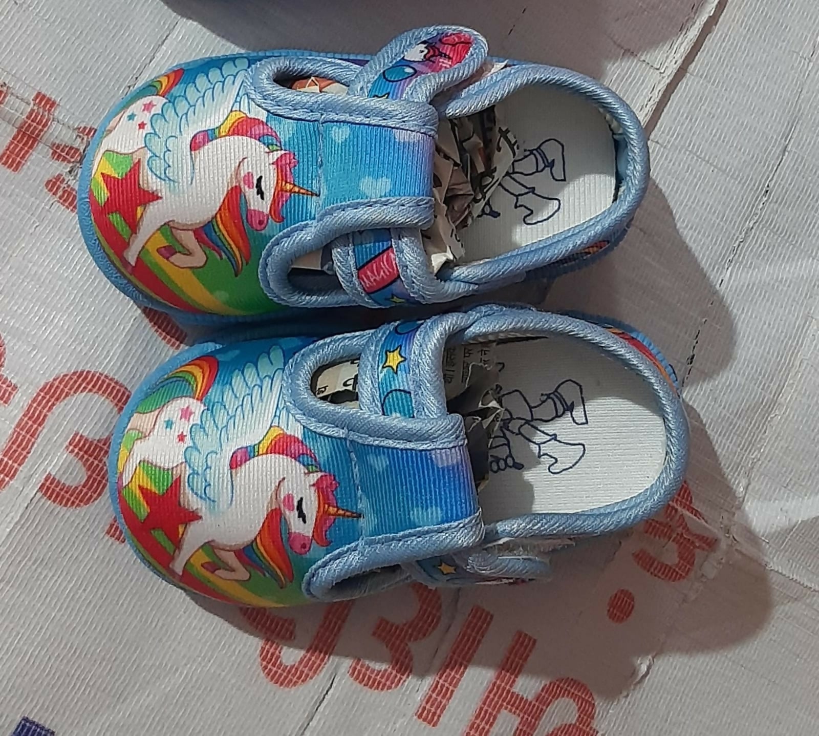 Colorful children's shoes with unicorn design 