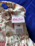 Floral baby outfit with a 'Little Lads' 