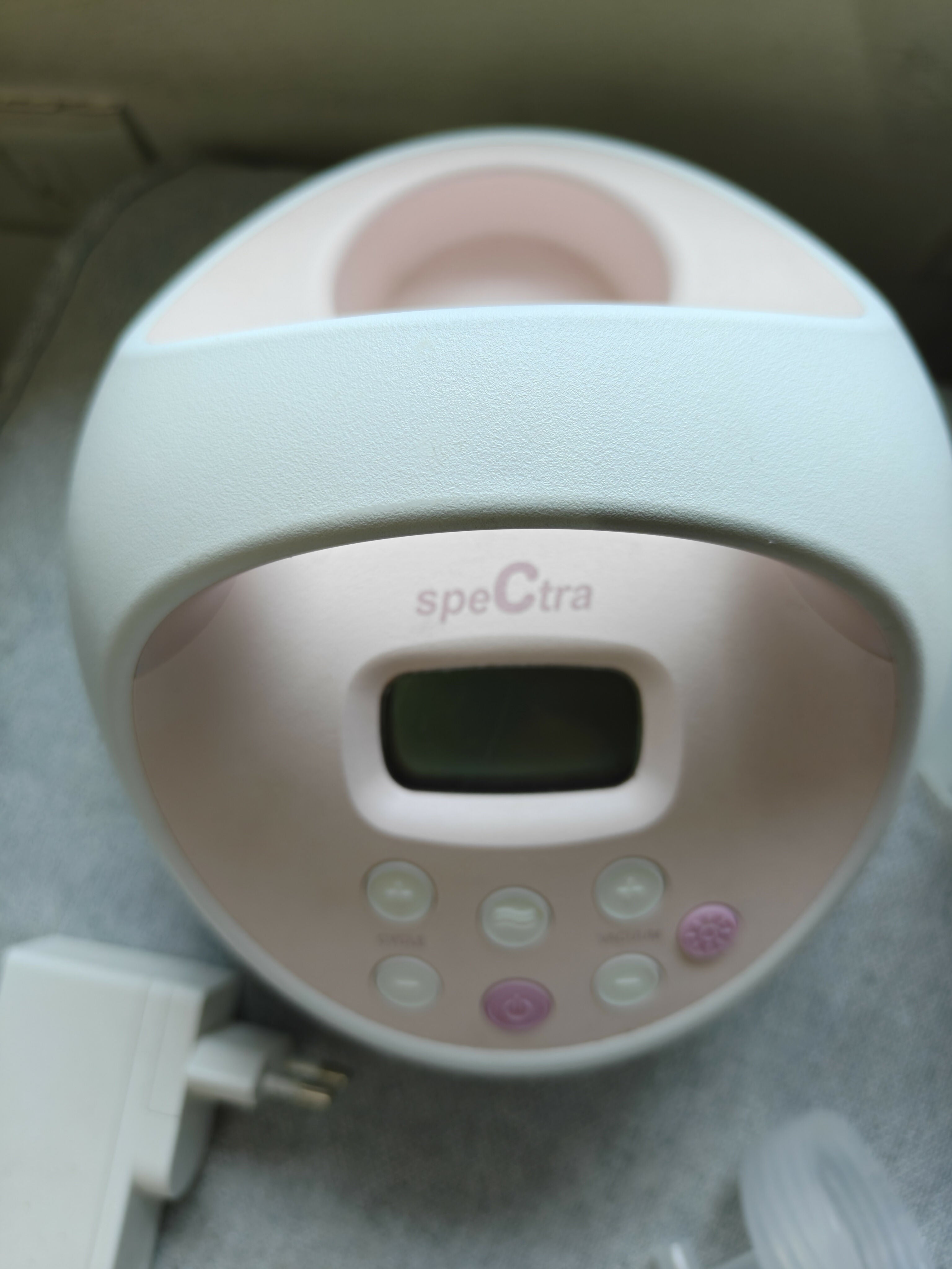 SPECTRA S2 Plus hospital-grade double electric breast pump with dual pumping system, adjustable suction settings, milk collection bottles, and comfortable breastfeeding support for nursing mothers.