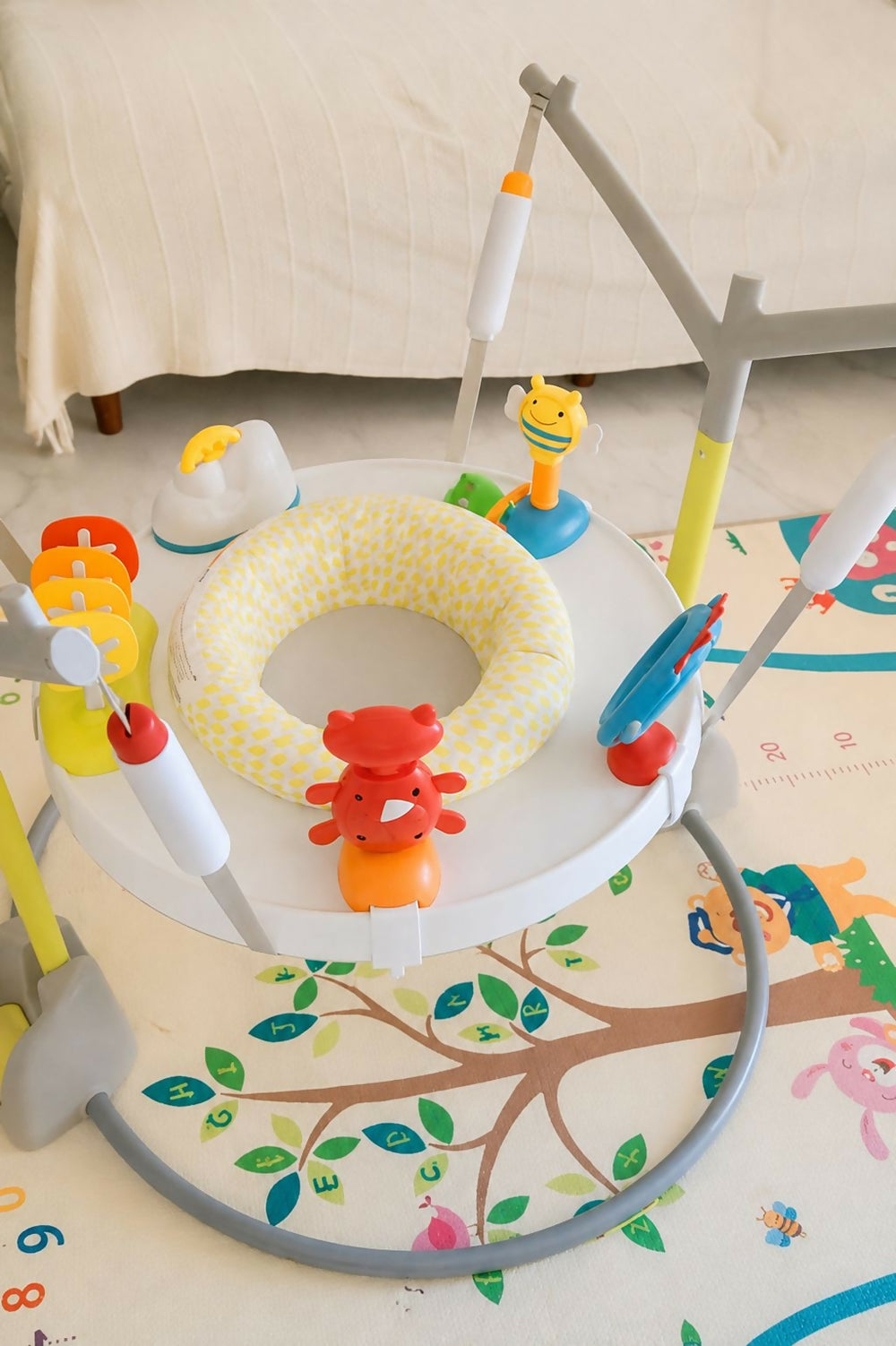 SKIP HOP Jumpscape Baby Activity Center in Almost New condition featuring an engaging play setup with interactive activities, supportive seating, and a child-friendly design for supervised play and exploration.
