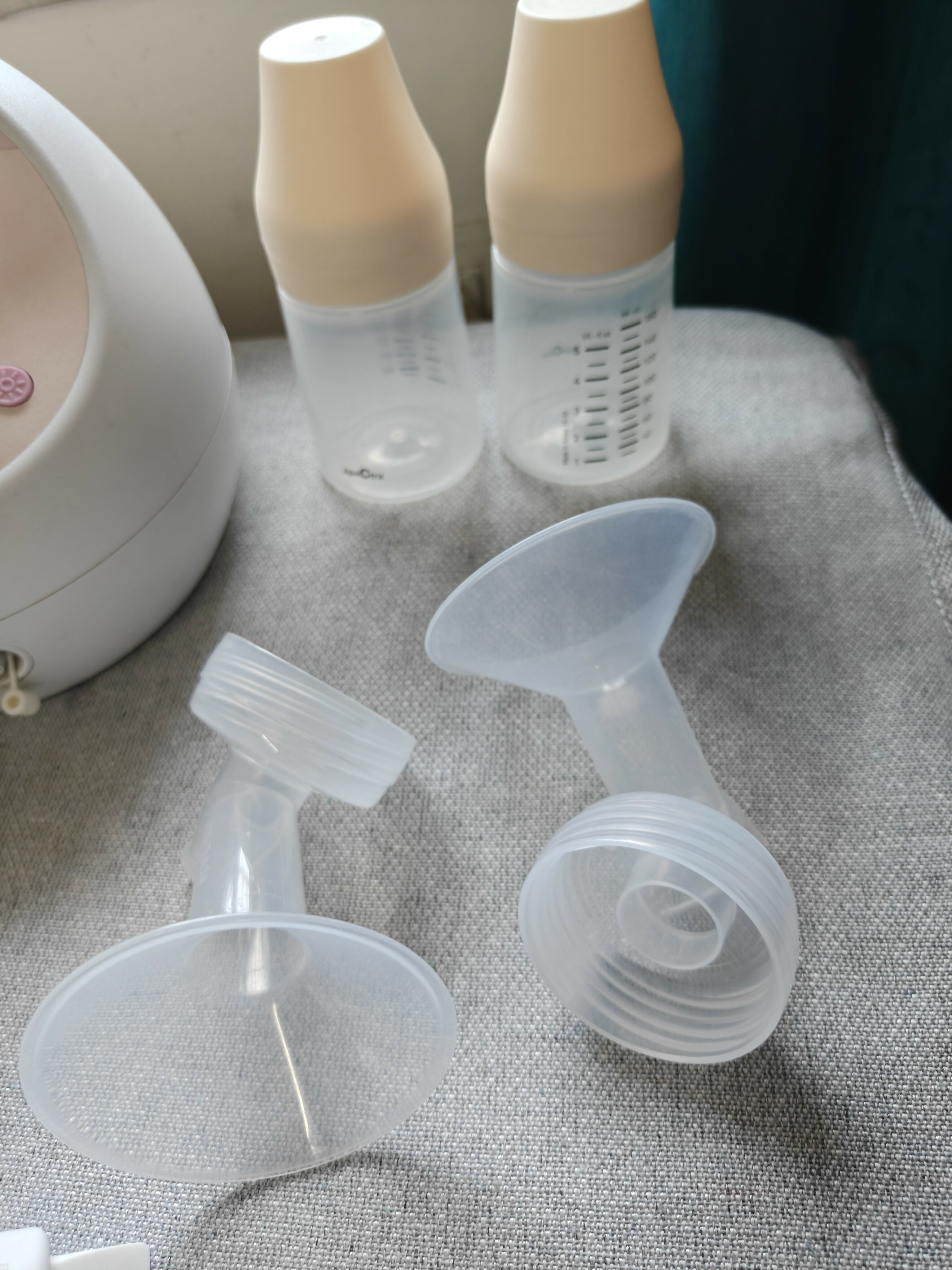 SPECTRA S2 Plus hospital-grade double electric breast pump with dual pumping system, adjustable suction settings, milk collection bottles, and comfortable breastfeeding support for nursing mothers.
