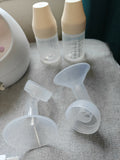 SPECTRA S2 Plus hospital-grade double electric breast pump with dual pumping system, adjustable suction settings, milk collection bottles, and comfortable breastfeeding support for nursing mothers.