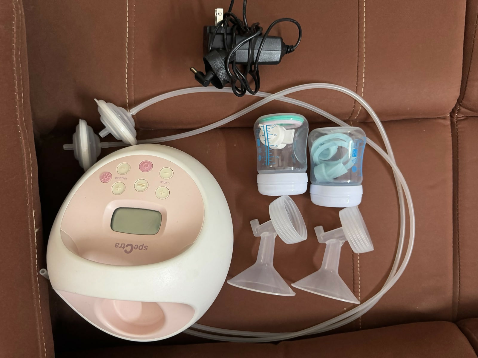 Spectra S2 USA wired electric breast pump with adjustable suction, hospital-grade performance, comfortable milk expression, and compact design for breastfeeding moms.