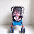 STAR & DAISY reversible baby stroller pram with mosquito net, reclining seat, reversible handle, safety harness, adjustable canopy, and comfortable travel support for babies.