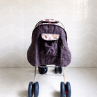STAR & DAISY reversible baby stroller pram with mosquito net, reclining seat, reversible handle, safety harness, adjustable canopy, and comfortable travel support for babies.