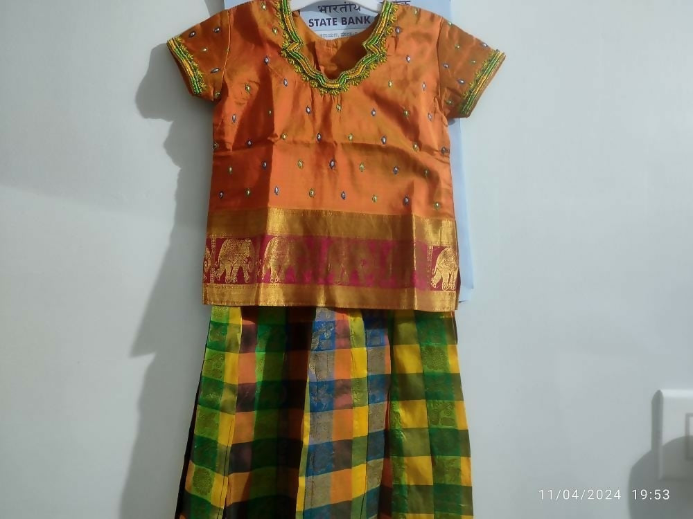 Dress your little girl in luxury and elegance with our Silk Lehenga and Blouse set, perfect for special occasions and celebrations.