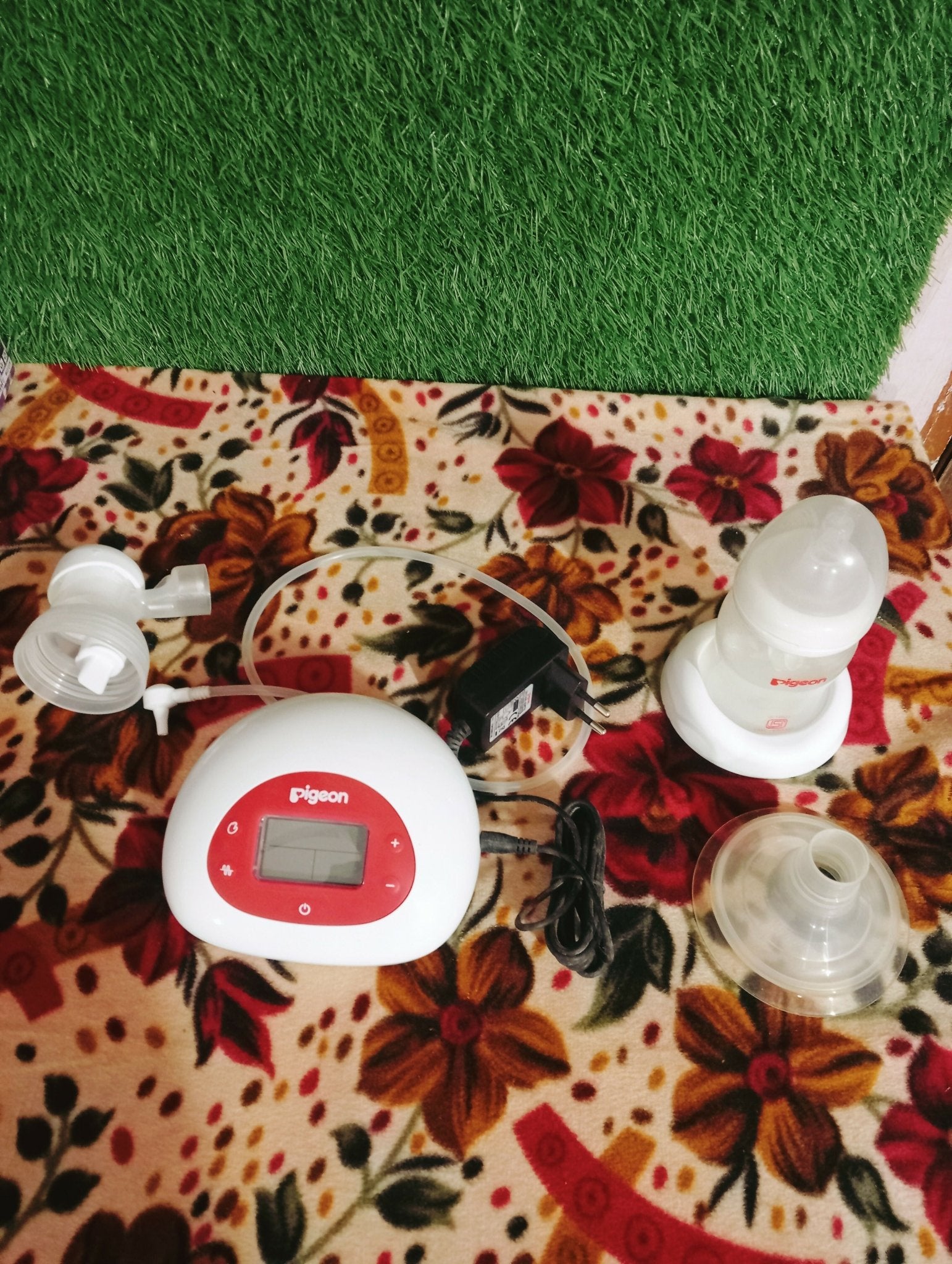 Pigeon electric breast pump with adjustable suction levels, soft silicone breast cushion, quiet operation, and efficient milk expression for comfortable breastfeeding support.