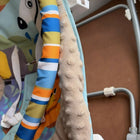 INFANTSO baby rocker and bouncer with a comfortable cushioned seat, gentle rocking motion, secure safety harness, and sturdy frame for soothing, relaxing, and playtime.