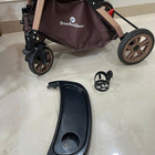 StarAndDaisy foldable baby stroller travel pram with reclining seat, sturdy wheels, safety harness, adjustable canopy, and compact foldable design for comfortable baby travel.