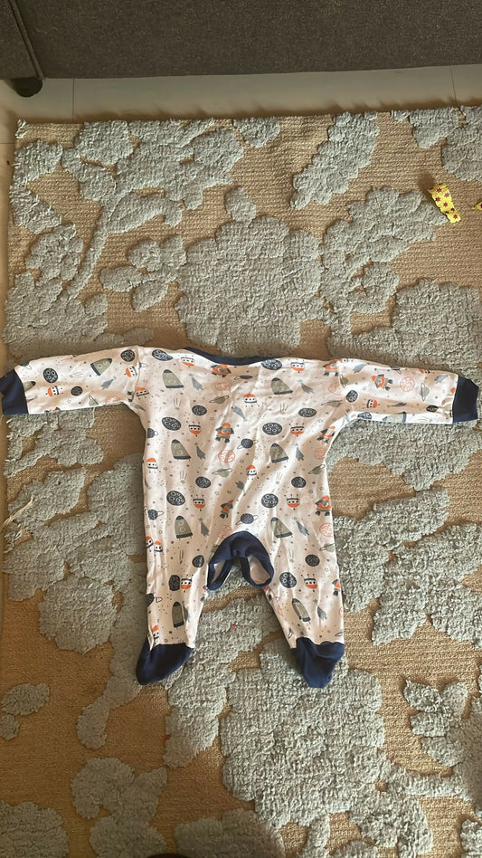 Keep your newborn cozy and cute with our Newborn Baby Onesie, crafted from soft cotton fabric for all-day comfort.