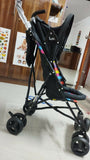 Experience comfort and safety with the LUVLAP Tutti Fruity Stroller/Pram, featuring a reversible handle, adjustable canopy, and three reclining positions for your baby’s needs.