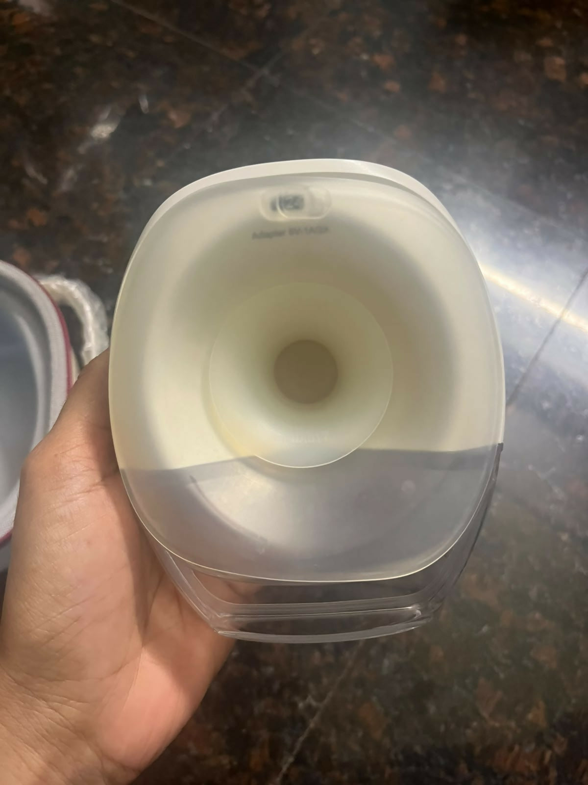 Pro Mom Wearable Breast Pump with a hands-free, compact design, adjustable suction settings, discreet in-bra fit, rechargeable operation, and milk collection cup for convenient pumping at home or on the go.