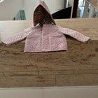 Dress your little fashionista in luxury with the Stylish Burberry Jacket with Detachable Hood - iconic style for every precious moment!