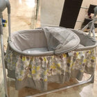 Discover the BABYHUG Automatic Cradle for Baby - NUBF027, featuring automatic rocking, multiple speed settings, a timer, and calming music for a soothing and secure sleeping environment.