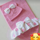 Shop now for our Child Safe Acrylic Yarn Cocoon + Cap set, offering warmth, safety, and adorable style for your newborn!