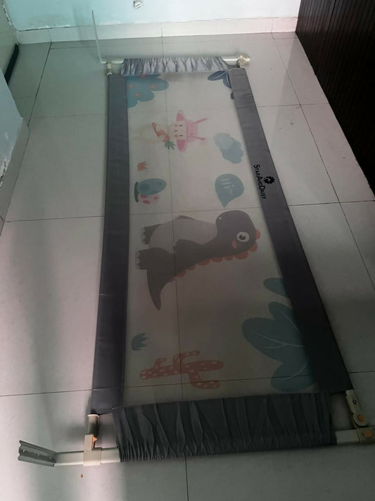 Children's play mat with cartoon designs on a tiled floor