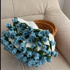 Knitted blue and white blanket 