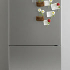 Stainless steel refrigerator with decorative magnets 