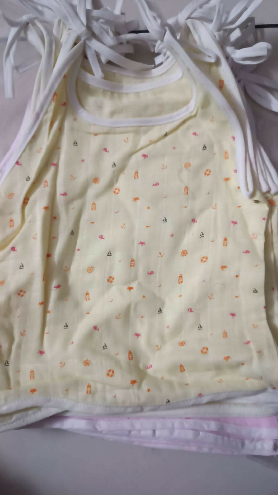 Soft and breathable Muslin Dori Zabla, made from 100% muslin cotton with adjustable ties for a comfortable and secure fit for your baby.