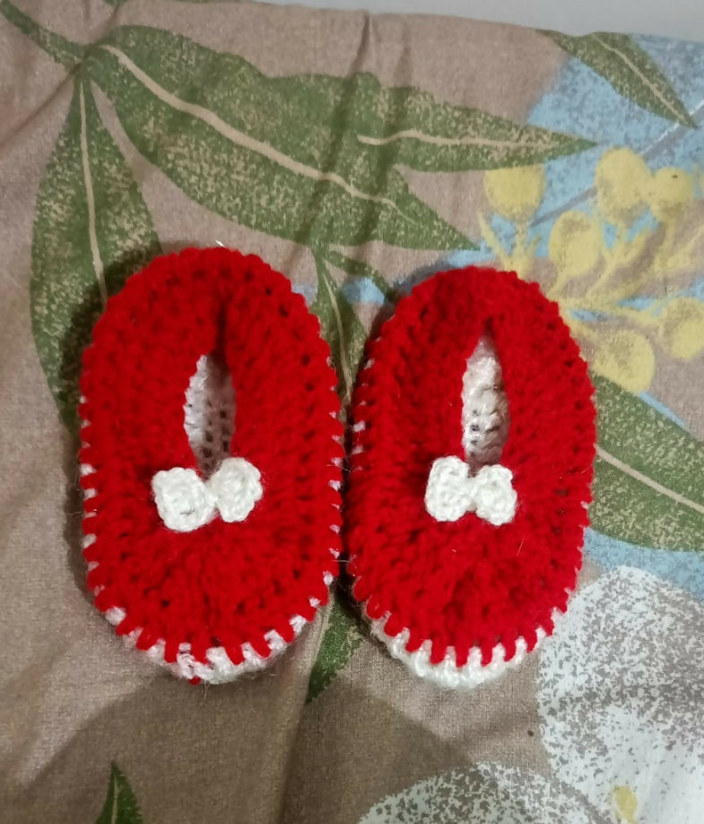 Red crocheted booties