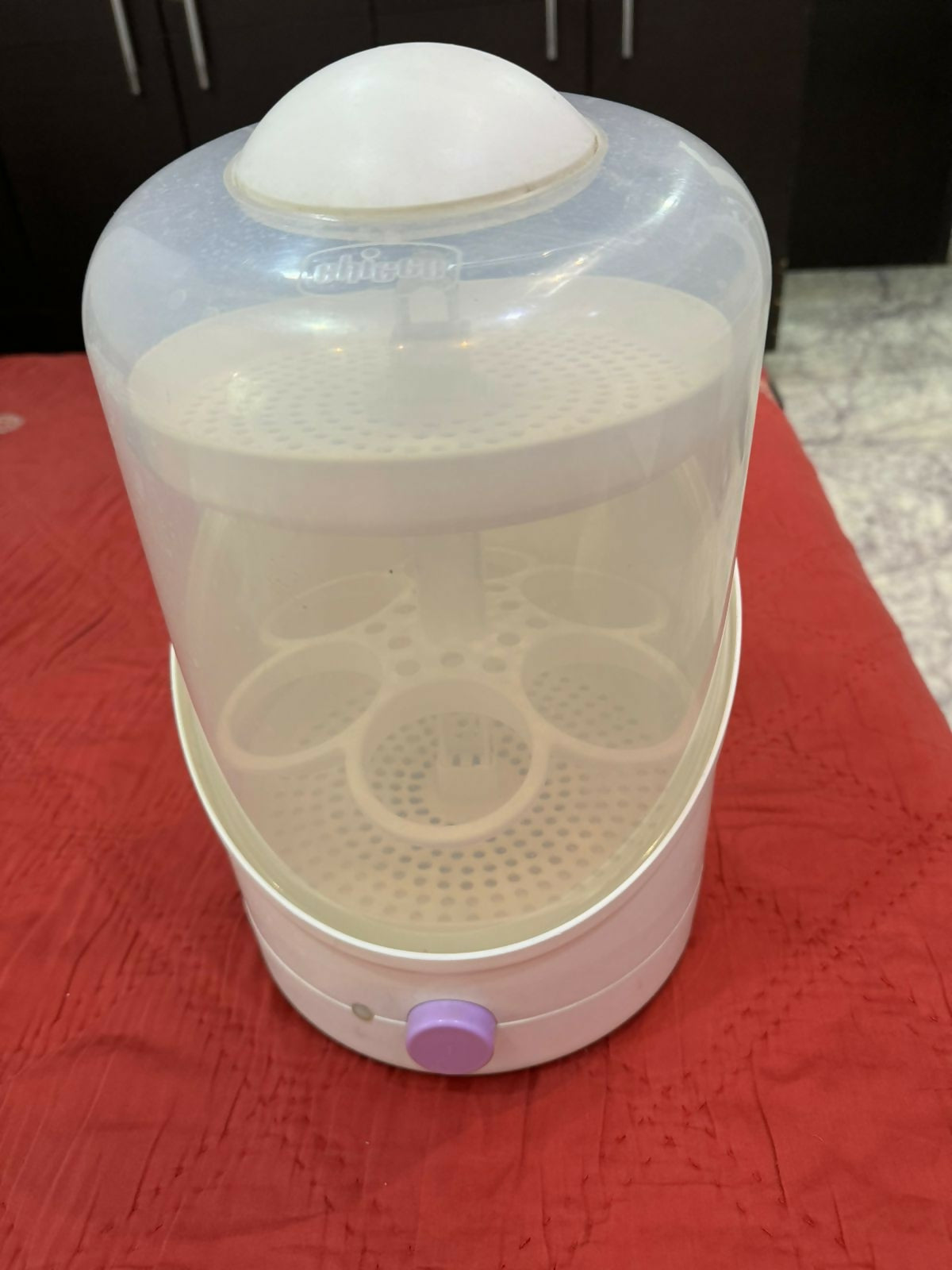 Keep your baby's feeding essentials clean and safe with the CHICCO Baby Steriliser/Sterilizer for Baby, offering efficient steam sterilization for bottles, nipples, pacifiers, and more. With its spacious design and user-friendly controls, it's the perfect addition to any parent's kitchen.