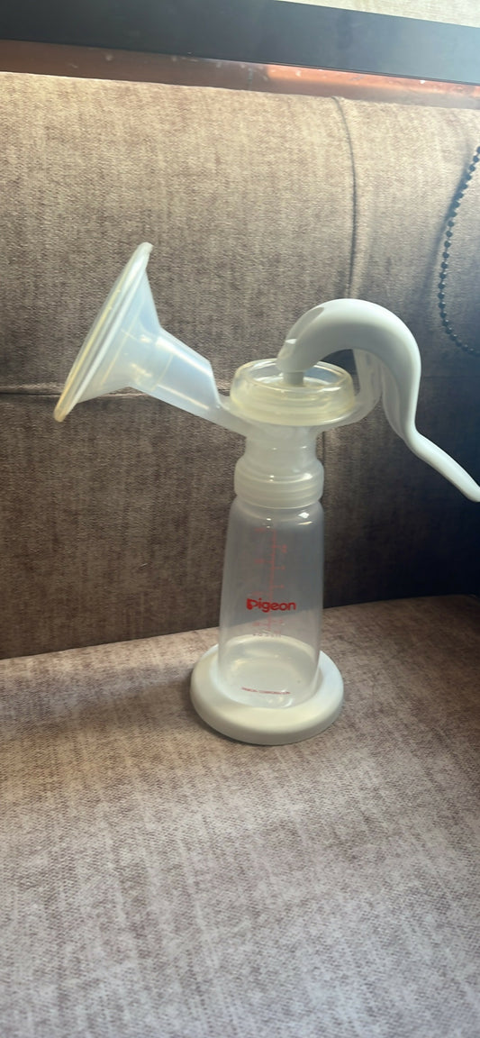 Manual breast pump on a textured surface