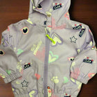 Children's gray jacket with colorful patterns and text 